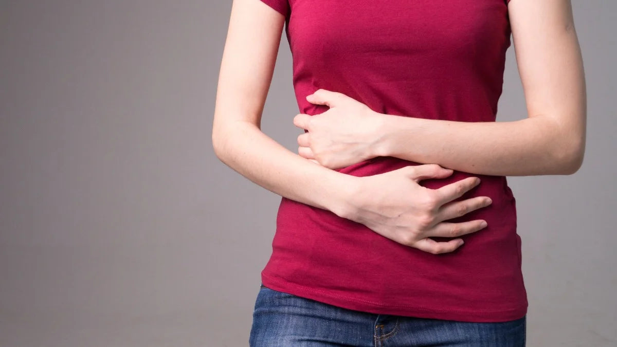 Woman Holding Stomach