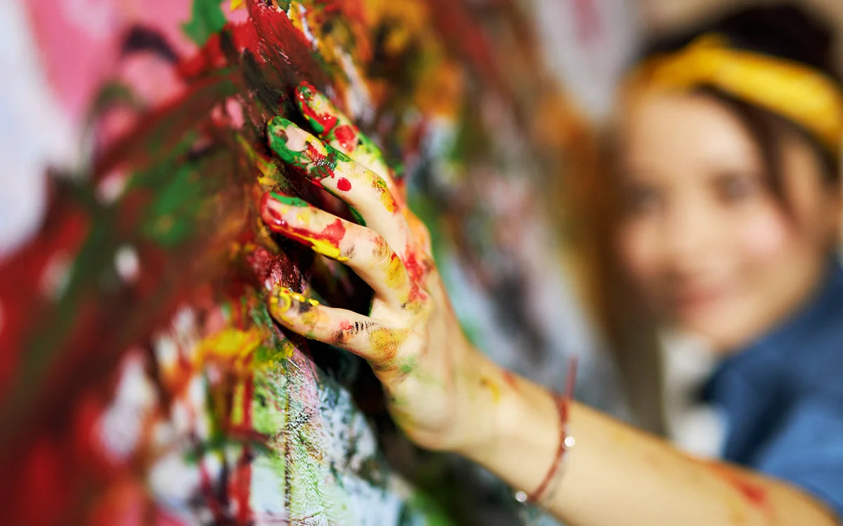 Woman Hand Covered In Paint