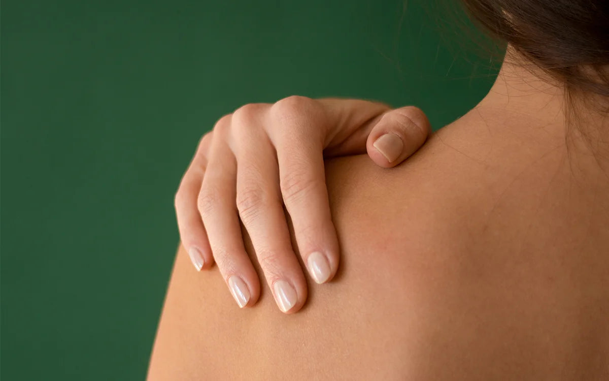 Woman with painful shoulder