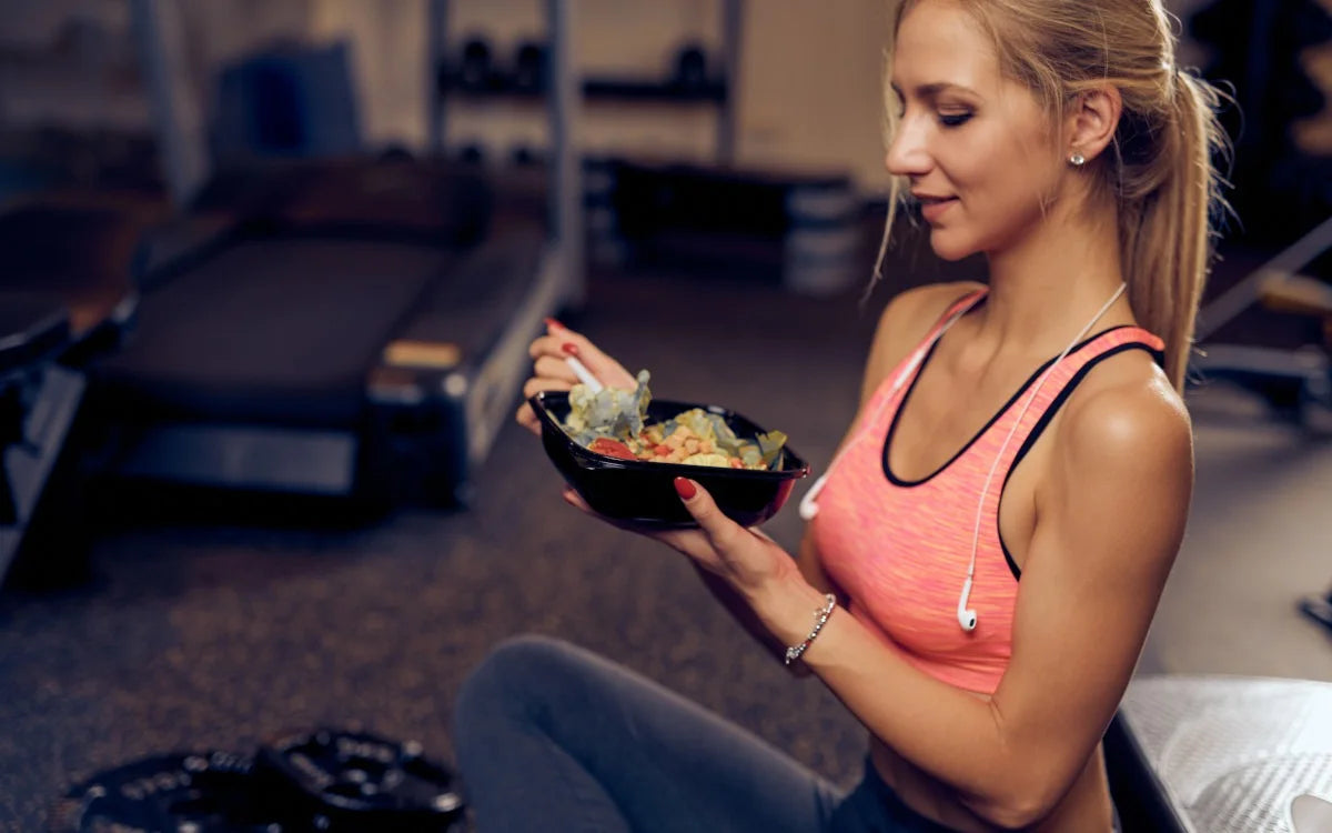 Woman eating nutritious food to build muscle