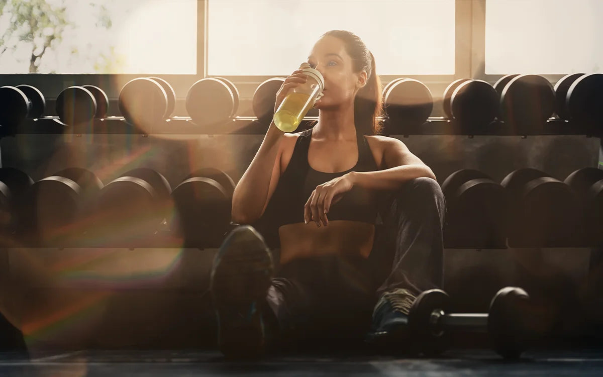 Woman drinking electrolytes