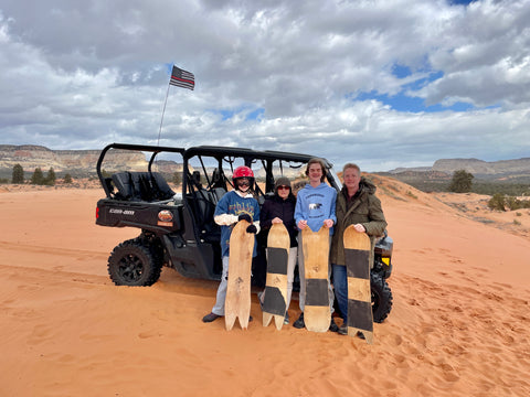 Sandboard with views of The Grand Staircase in Kanab on UTV Slot Canyon Tour