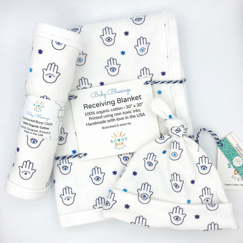 Adorable, Blue Hamsa-Patterned, Organic Cotton Baby Items to protect Jewish babies from the evil eye - burp cloth, baby blanket, and baby hat - designed by Sunny Day Designs exclusively for JEW-ishly.com