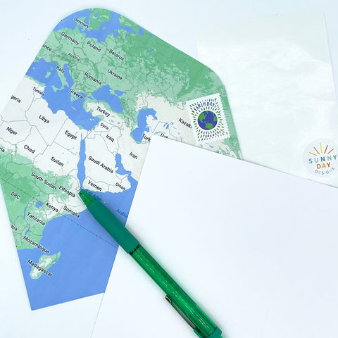 Blue and Green Greeting Card Envelope Made From Repurposed Map with Green Pen and Open Blank Greeting Card by Sunny Day Designs - Snail Mail Fun Blog Post