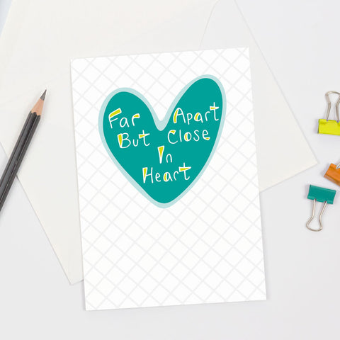 Far Apart but Close In Heart greeting card features a turquoise heart and is well-suited for long distance messages