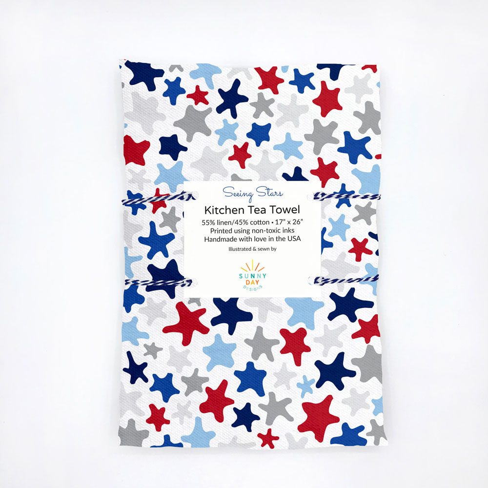 https://cdn.shopify.com/s/files/1/0430/4057/1556/products/Seeing-Stars-Tea-Towel-Packaged-Sunny-Day-Designs-MU-Flattened-LowRes_1024x1024.jpg?v=1612138930