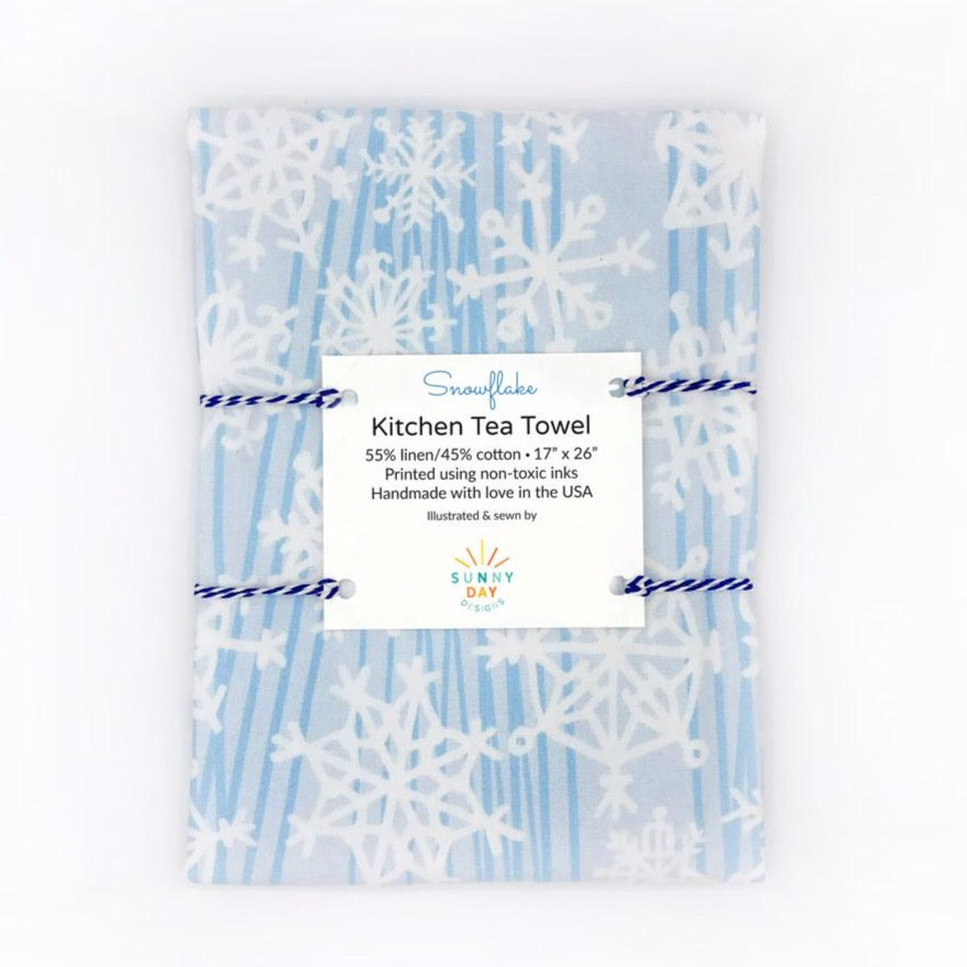 https://cdn.shopify.com/s/files/1/0430/4057/1556/products/Snowflake-Kitchen-Tea-Towel-Packaged-Sunny-Day-Designs-Flattened-LowRes_1024x1024.jpg?v=1612239694
