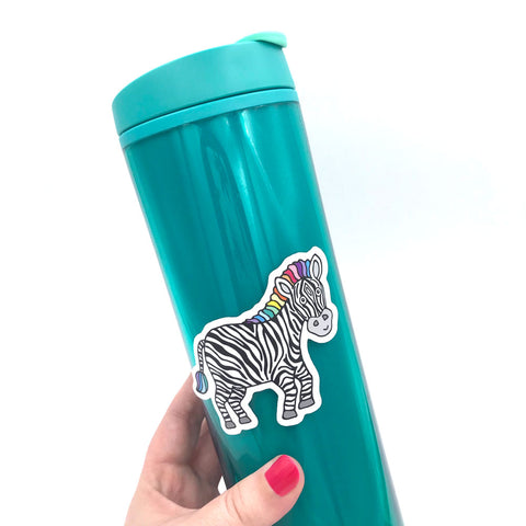 a turquoise water bottle decorated with a colorful and cute zebra sticker by Sunny Day Designs, which helps raise money for the National Organization for Rare Disorders.