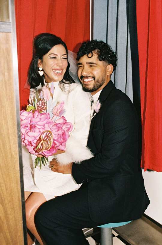 Karla and Ramiro in the Photo Booth at Sure Thing Chapel