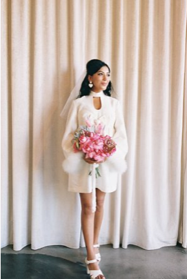Karla holding her bridal bouquet at Sure Thing Chapel Las Vegas