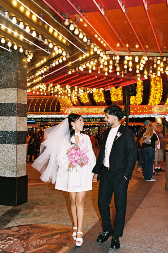 bride and groom walking around Las Vegas