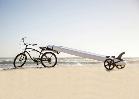 SUP Wheels board on a bike with inflatable paddle board 