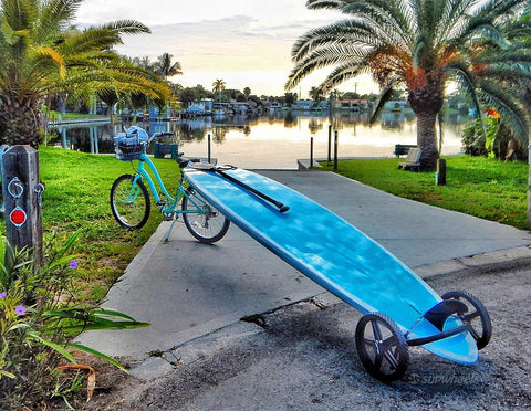 Paddle board trolley on a bike with SUP Wheels