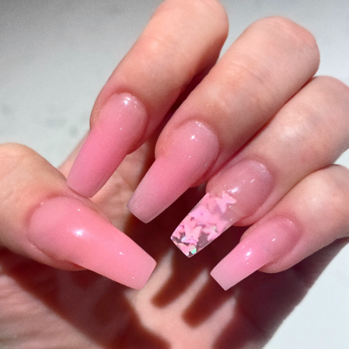 light pink acrylic nails with butterflies