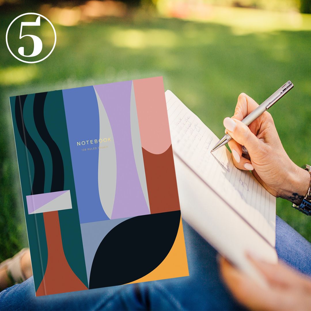 Woman writing in Journal with Wrap Lay flat Notebook overlaying image