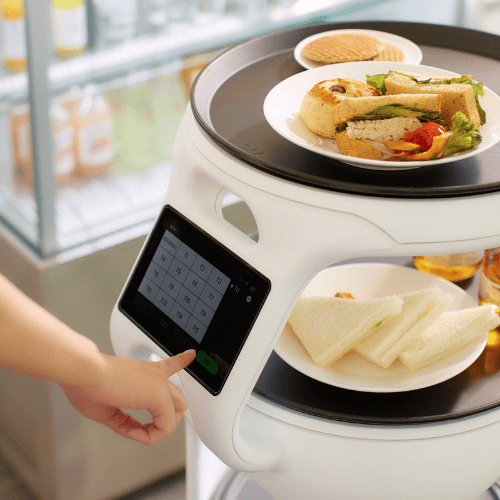 Image of the Servi service robot being used to improve a restaurant.