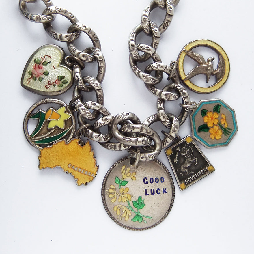 Yellow Antique and Vintage Charms on Charm Bracelet | Silver Star Charms