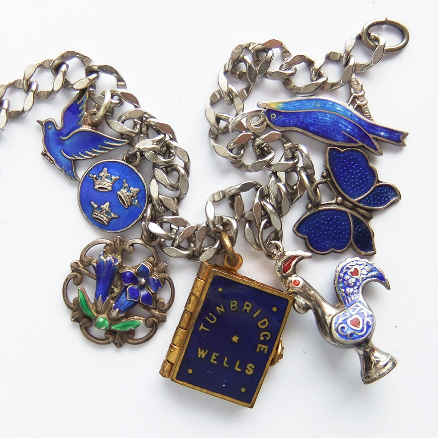 Charm bracelet with antique and vintage enamel and crystal indigo charms | Silver Star Charms