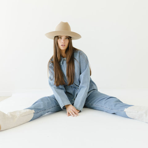 Tan cowgirl felt hat with cowgirl boots