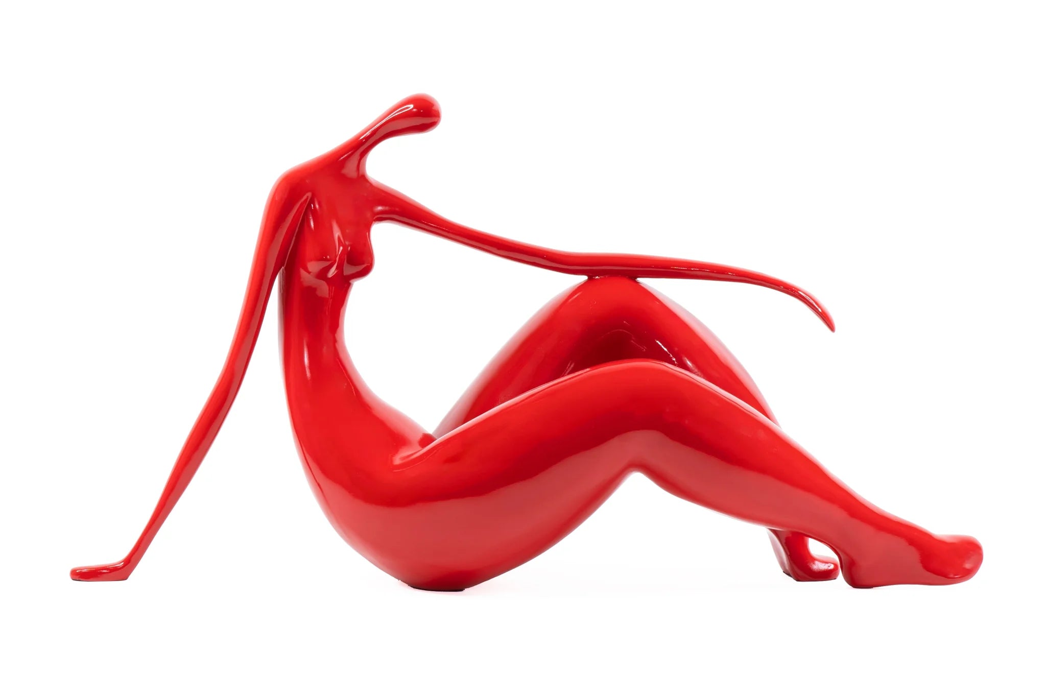 Small Sculpture of a Woman in a Relaxed Sitting Back Pose