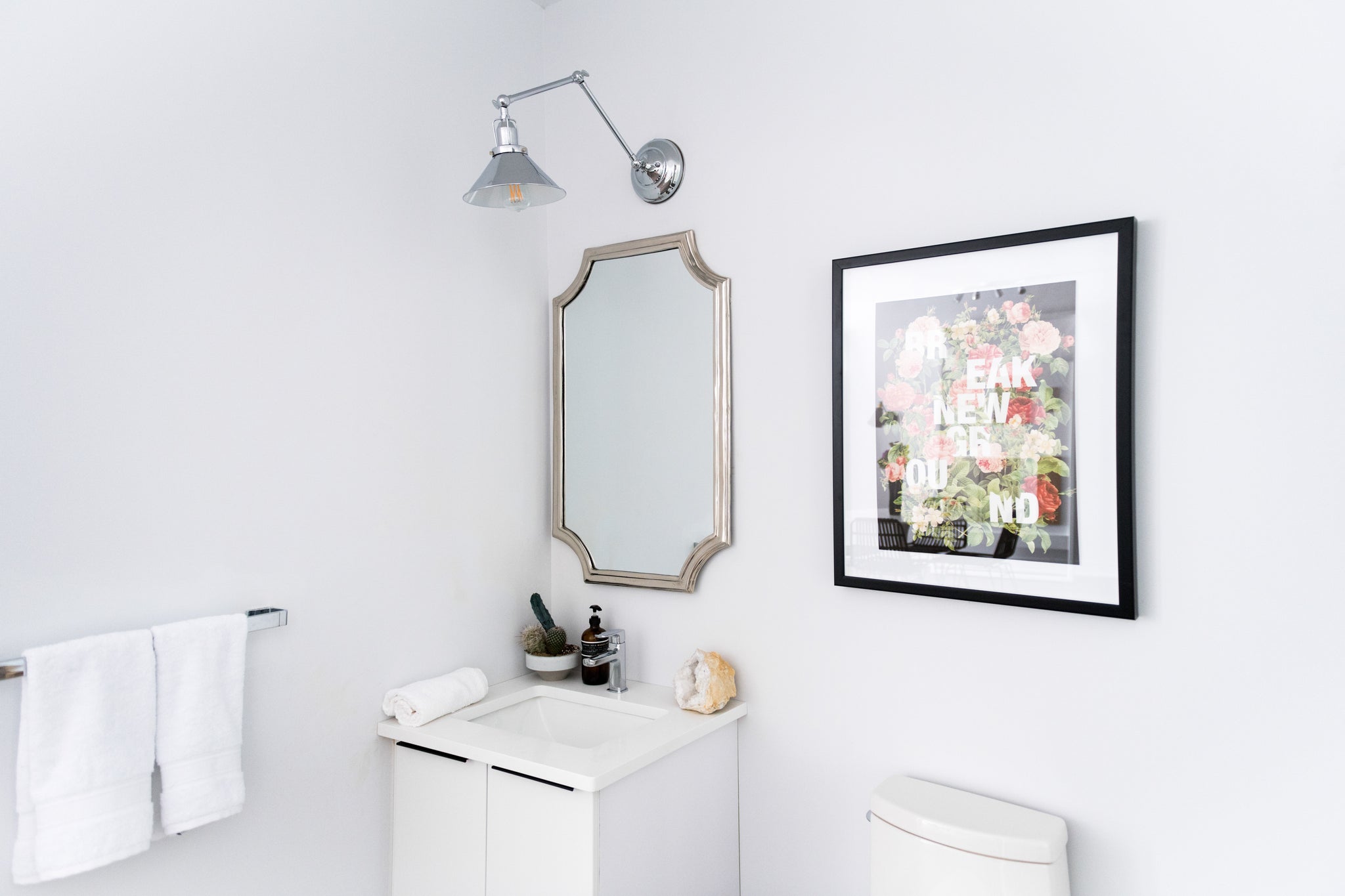 Freshtowns Sales Centre bathroom. Sink and toilet.