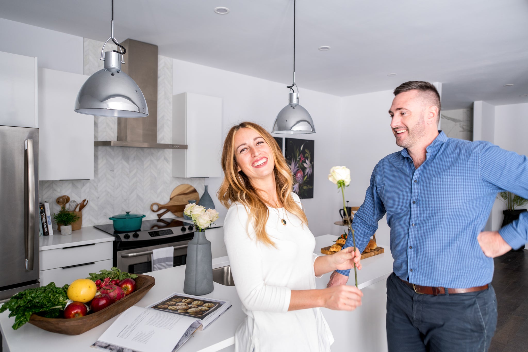 Freshtowns Sales Centre. Couple in the kitchen.