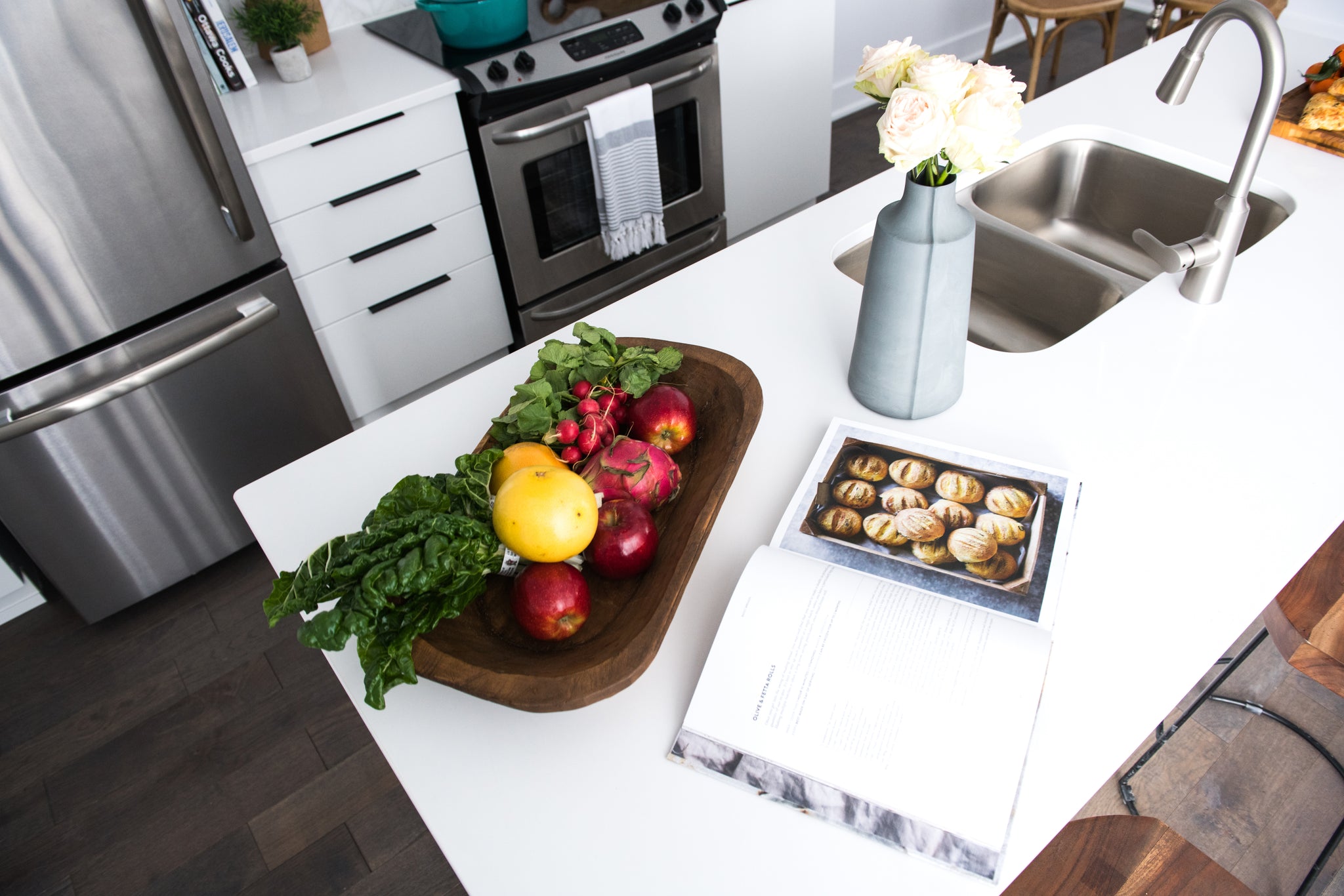 Freshtowns Sales Centre kitchen flat lay view of island with fruit bowl.