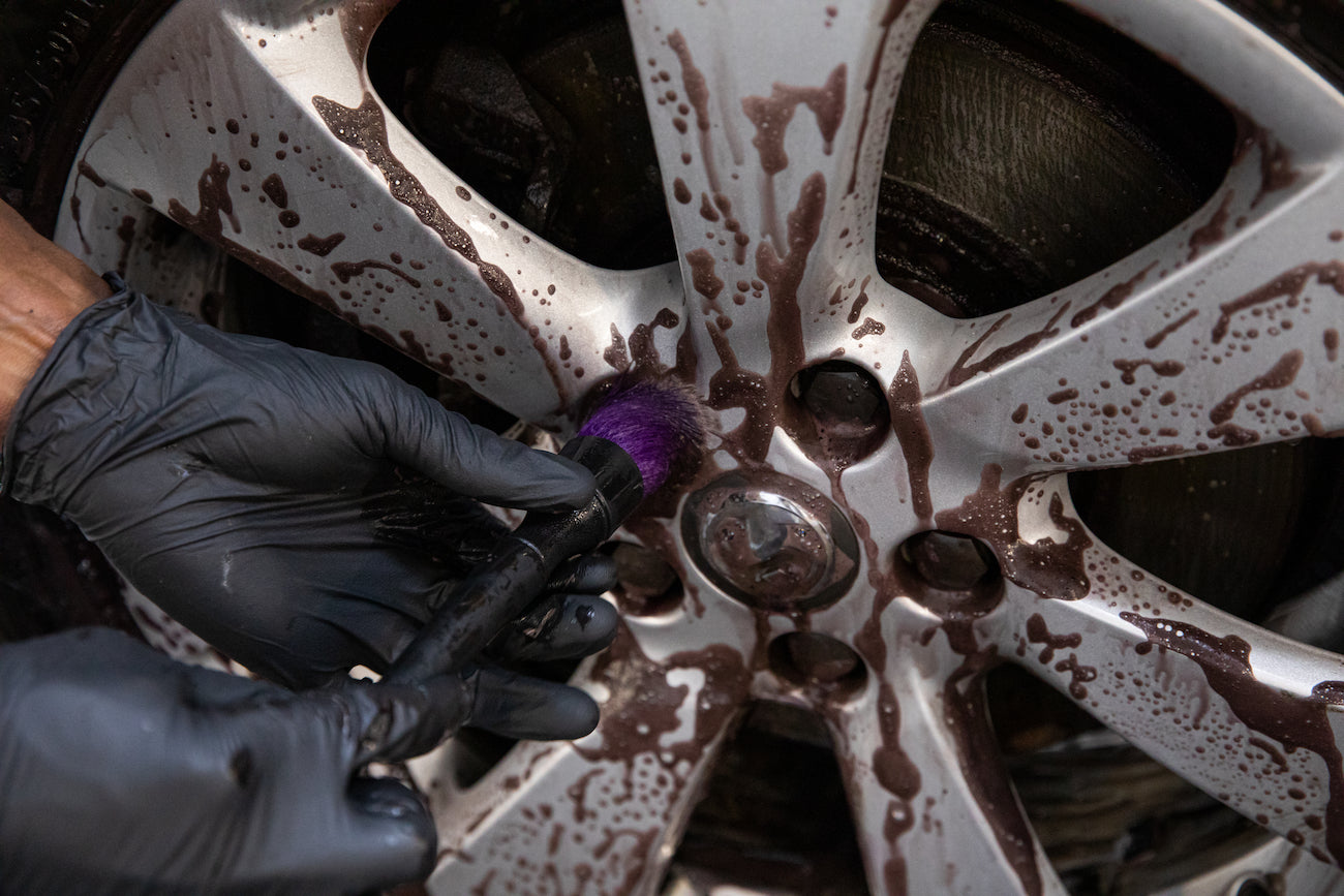 Cleaning wheel socket with Car Gods feather tip brush