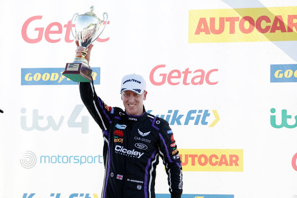 Morgan holding trophy after win at Brands Hatch