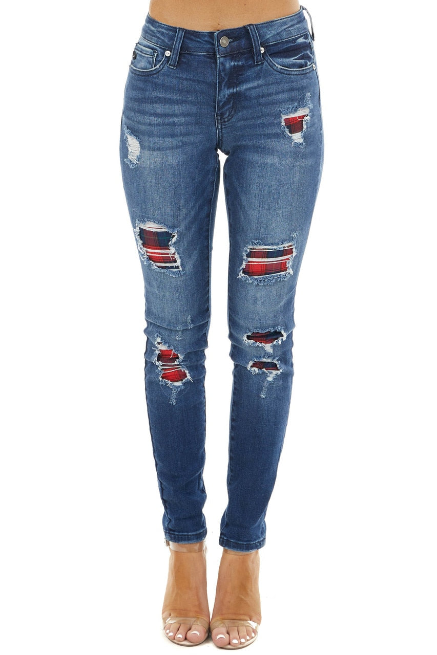 medium wash distressed skinny jeans with leopard print patch