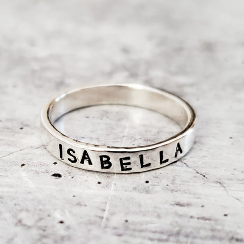 Hand stamped sterling silver name ring