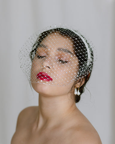 crystal encrusted bridal birdcage veil on a headband designed by Blair Nadeau Bridal in Toronto Ontario canada
