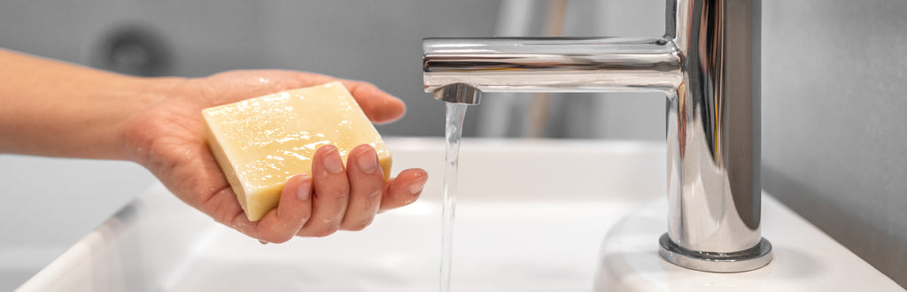 Hand washing with soap bar