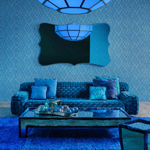 Casa Azul collection also features a blue velvet sofa and a methacrylate suspension lamp