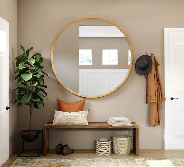 Entryway with a huge mirror on the wall