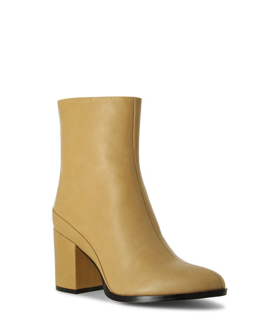 Tan leather ankle boots with an inner zip fastening and featuring a clean central seam, block heel and a pointed toe by EOS.