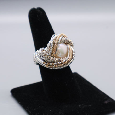 Ring in 14k yellow gold and sterling silver wire with a cultured white freshwater pearl and faceted pink sapphires constructed using only needle nose pliers—no drills, glue, solder, heat, or magnification, by Jonathan Bassett of Transcendental Jewelry