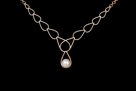 Gentle Rain necklace with a white pearl and diamonds by Da Ning Zhang, associate professor, Jilin University of Arts, China