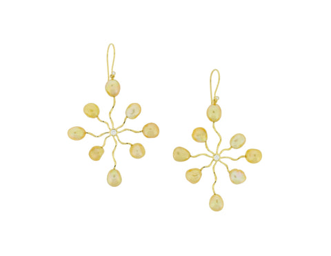 Sea Star earrings by Mary Kay and Patrick Mohs of Patrick Mohs Jewelry in Wayzata, Minn. Made in 18k gold with golden South Sea pearls and diamond accents. 