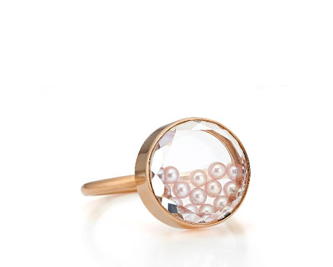 Concha ring in 18k rose gold with natural-color pink freshwater pearls encased in a white sapphire kaleidoscope shaker, $1,900; Moritz Glik