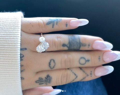 Ariana Grande in her pearl and diamond engagement ring Source: @arianagrande