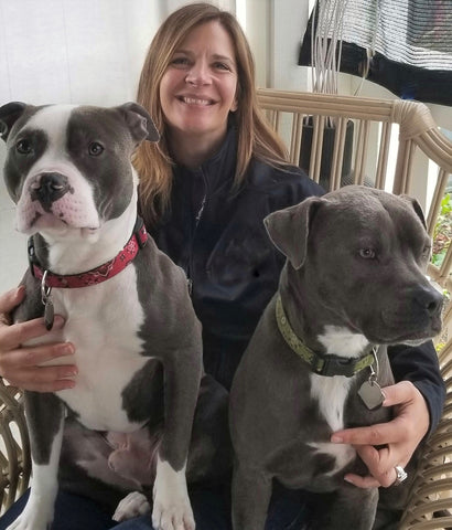 Annette Wachter of RudyBlu Jewelry with her dogs, Rudy and Blue