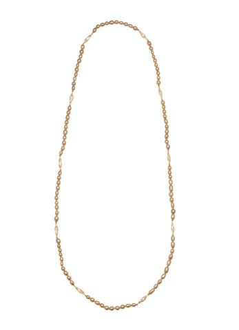 Necklace in 18k yellow gold with golden South Sea keshi pearls from the Caravelles collection by Jewelmer. Caravelle depicts the fluid lines of excitement present in long voyages, like those taken by the Portuguese in the 16th century on caravel ships. Email marion.branellec@jewelmer.com for purchase.