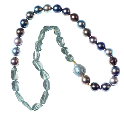 Twenty-inch necklace in Tahitian pearls and praisiolite with a proprietary South Sea pearl clasp inset with blue topaz, $1,295; Judi McCormick Jewelry