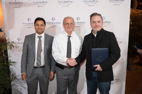 Anil Maloo and Aziz Basalely with IPDC winner Phillip Dismuke of Jewelsmith