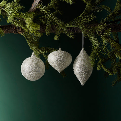 https://www.pier1.com/products/beaded-glass-tree-ornament-set-of-6-silver