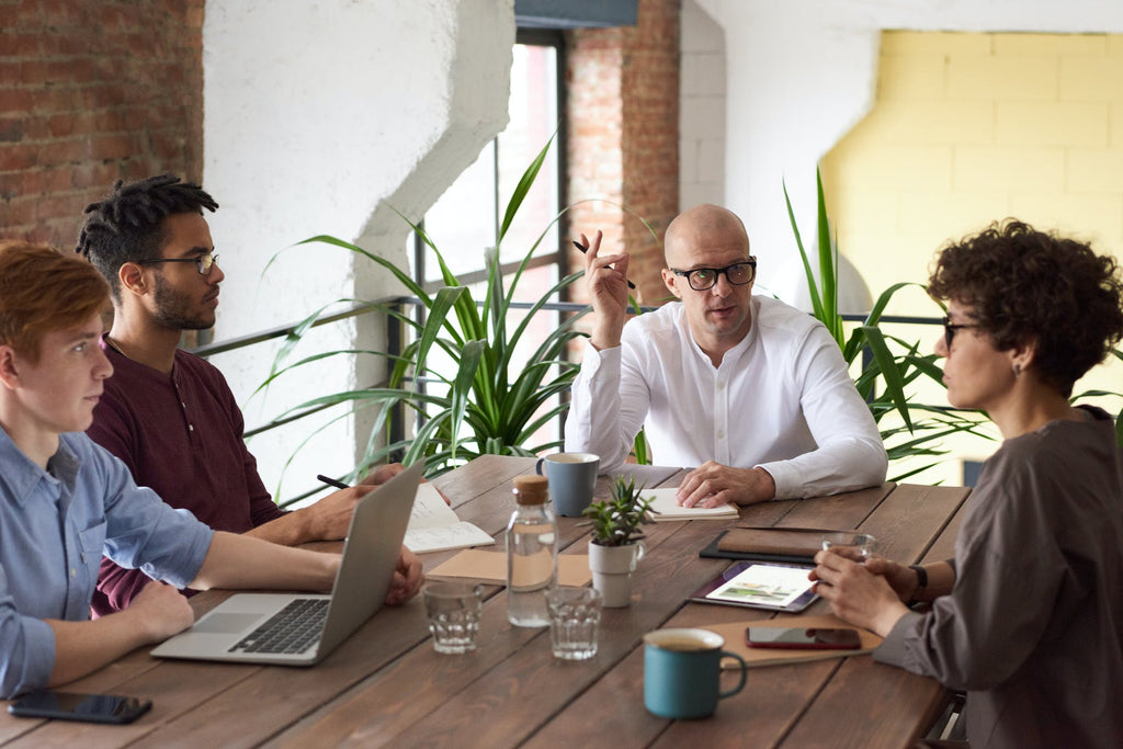 team meeting over coffee