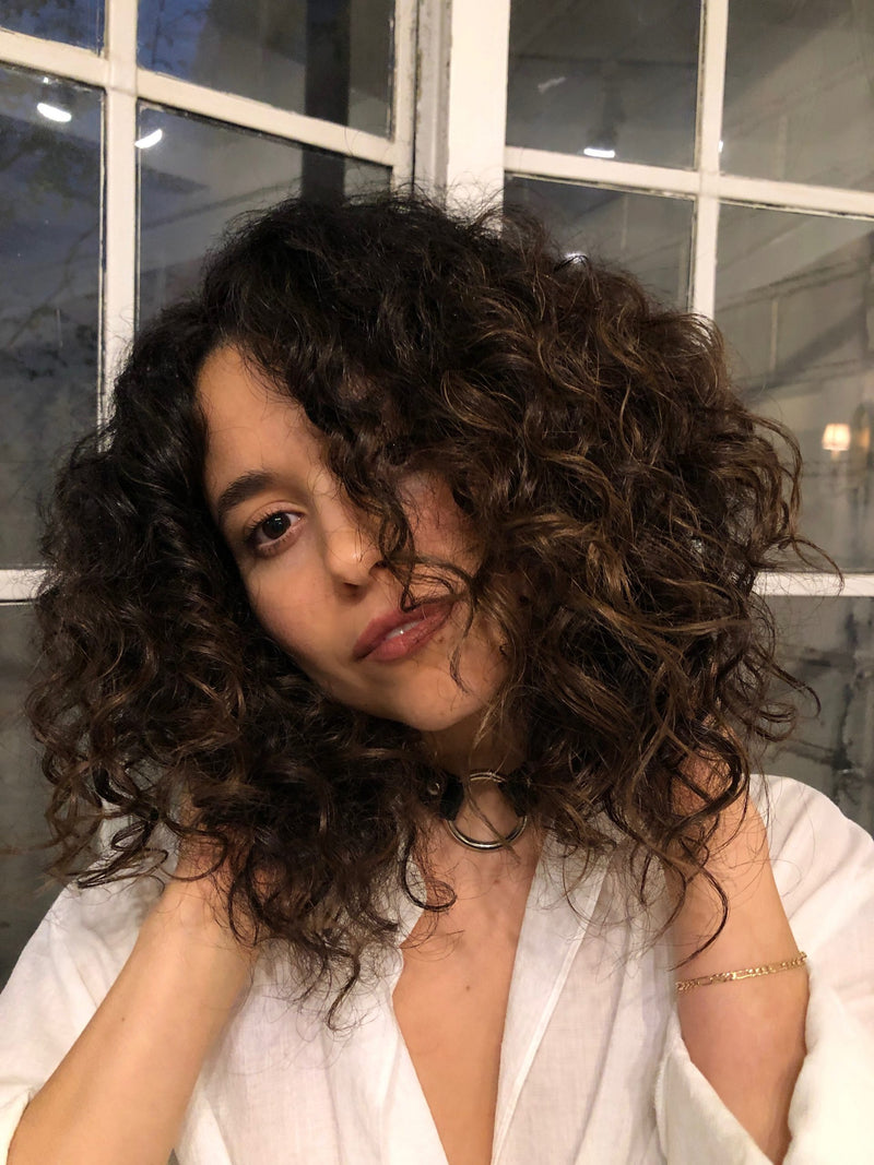 4 Things My Curly Hair Can't Live Without - OLAPLEX Inc.