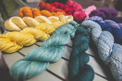 Naturally dyed skeins of yarn
