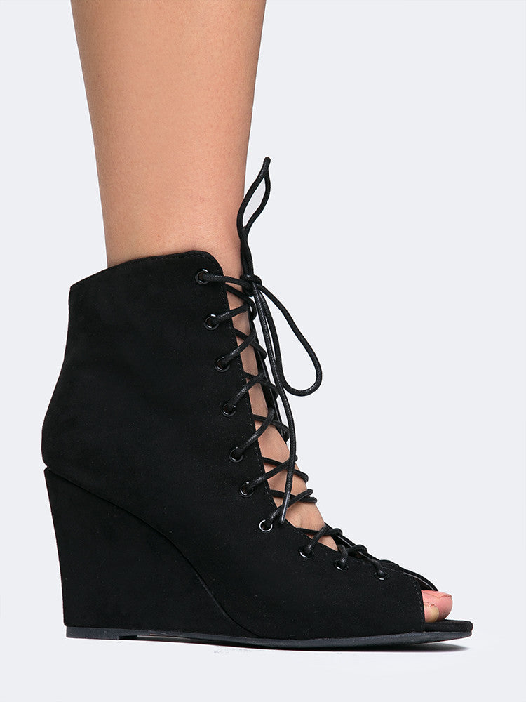 black suede lace up wedge booties
